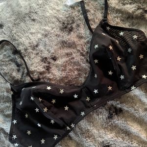 Black DKNY bralette with silver stars